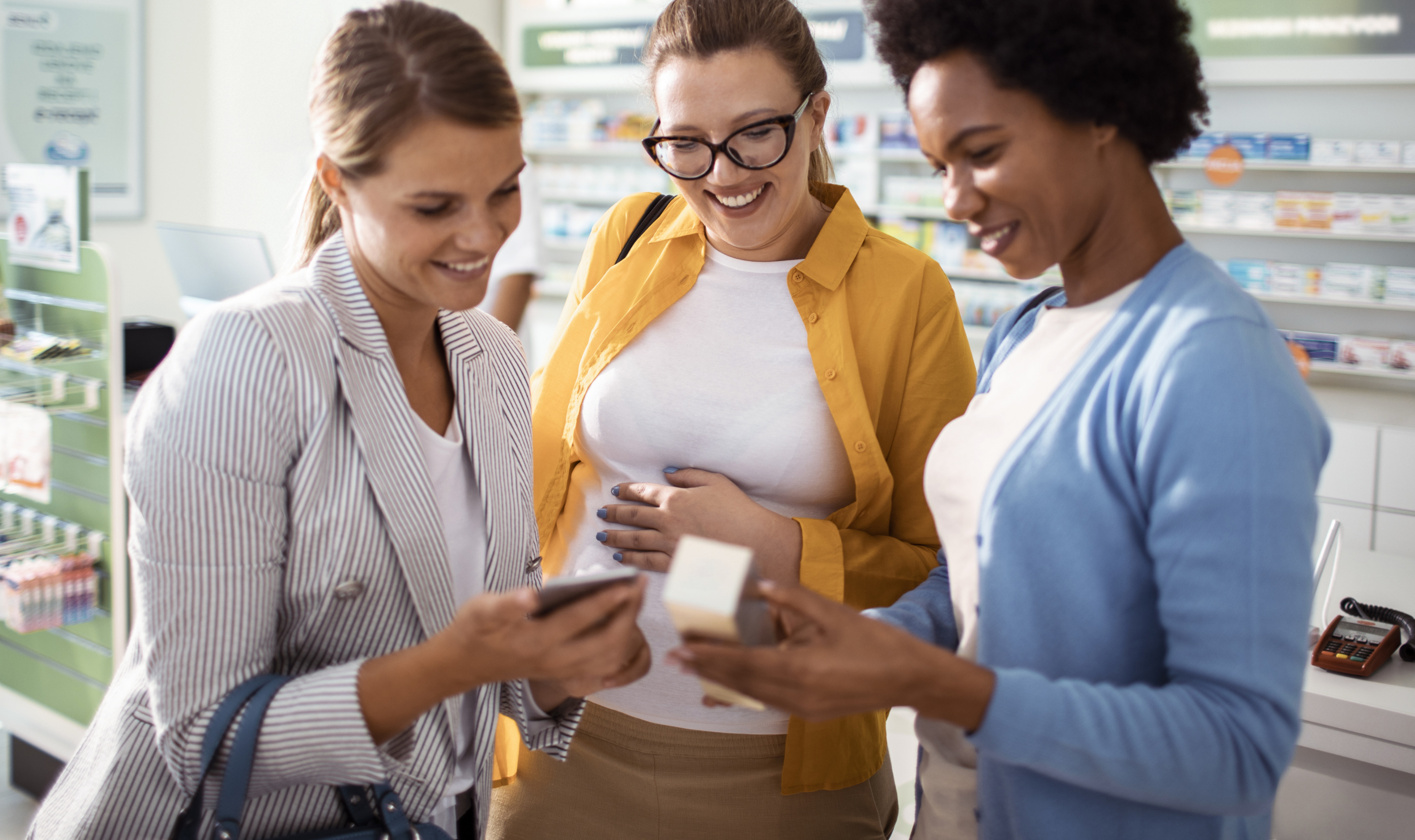 three women choosing a product