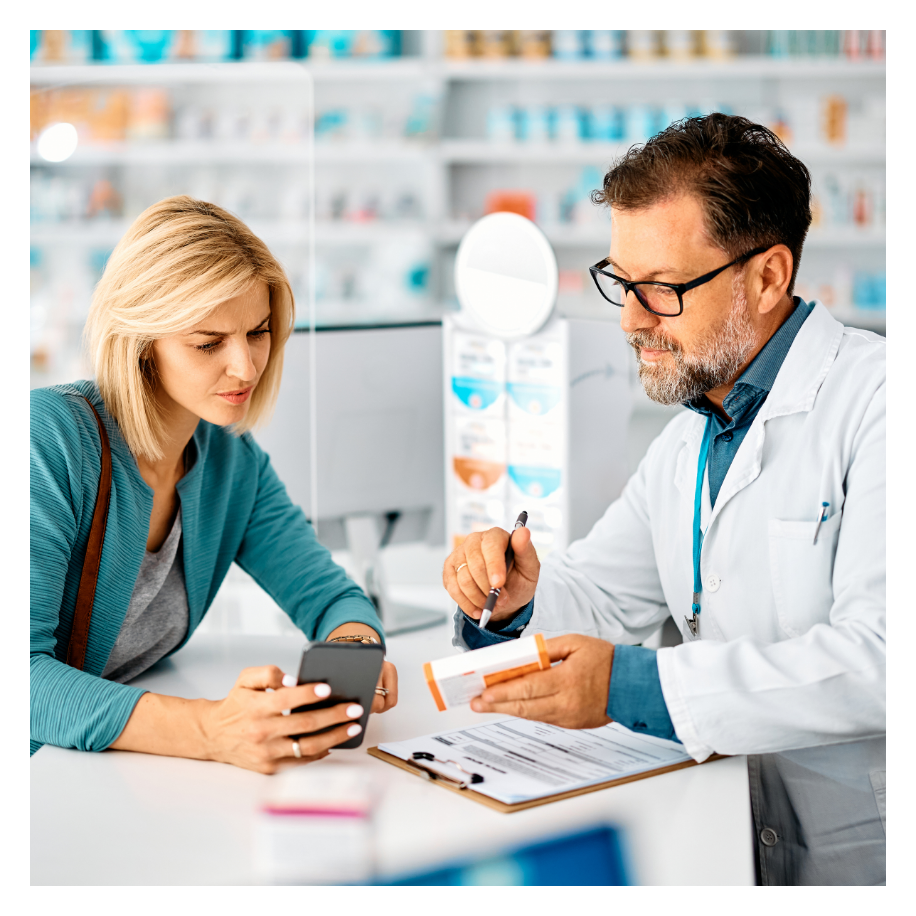 Pharmacist with a customer